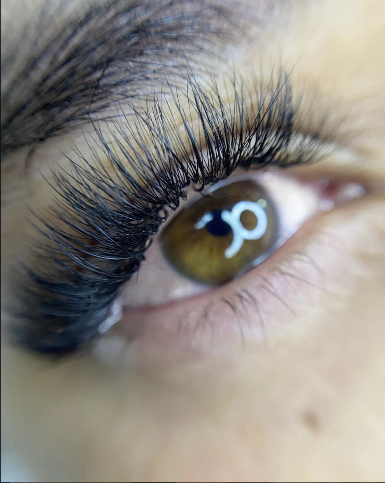 Macro close-up of a hybrid lash set on a hazel eye by Lashes by Dee, Paarl