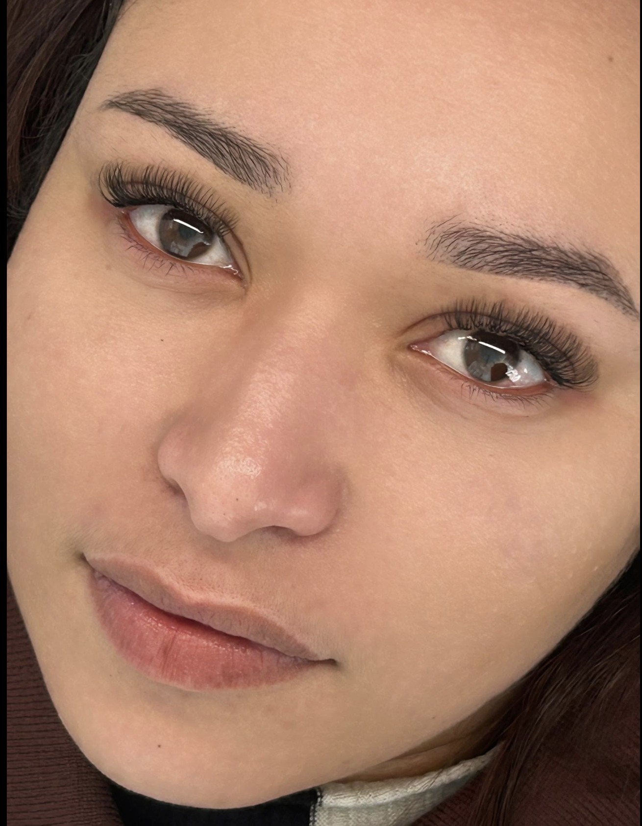 Classic lash set on a brown-eyed client by Lashes by Dee, Paarl