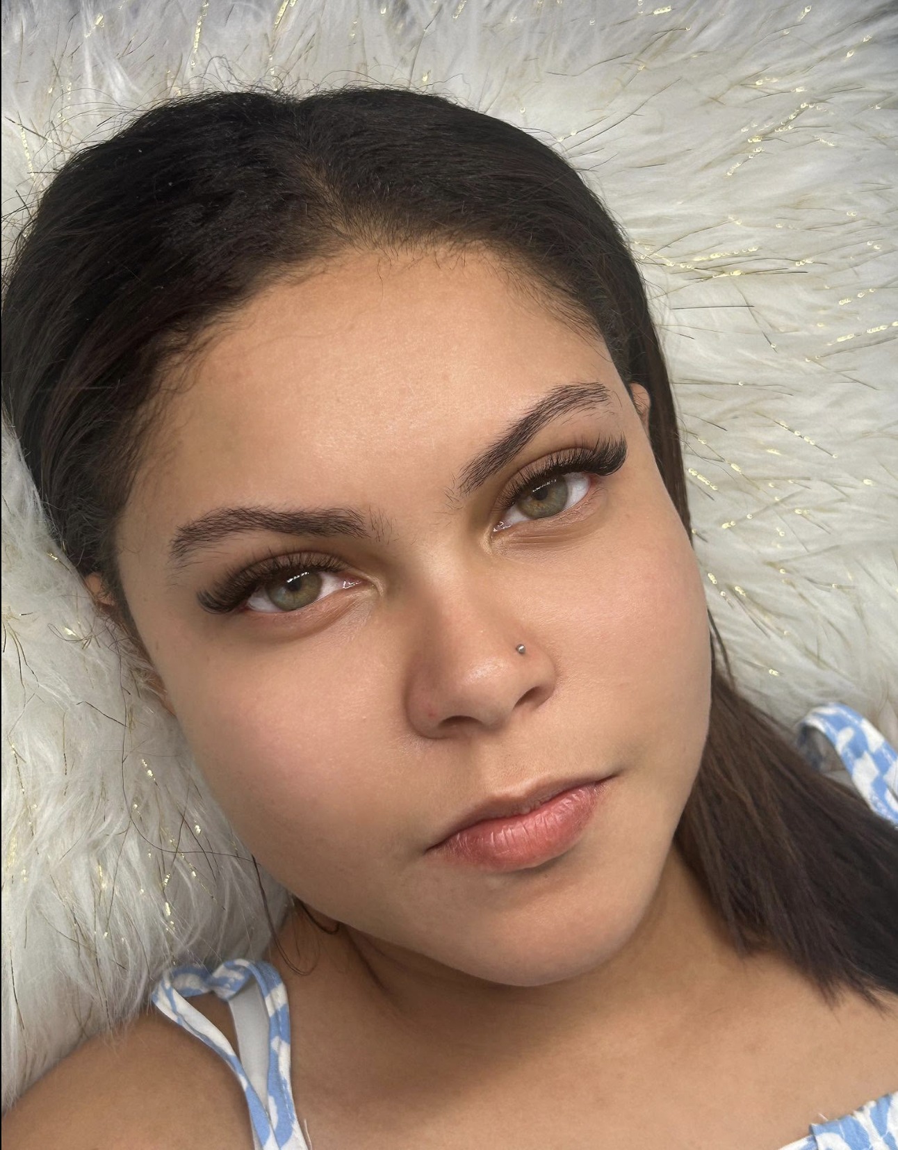 Soft natural lash set on a young client by Lashes by Dee, Paarl